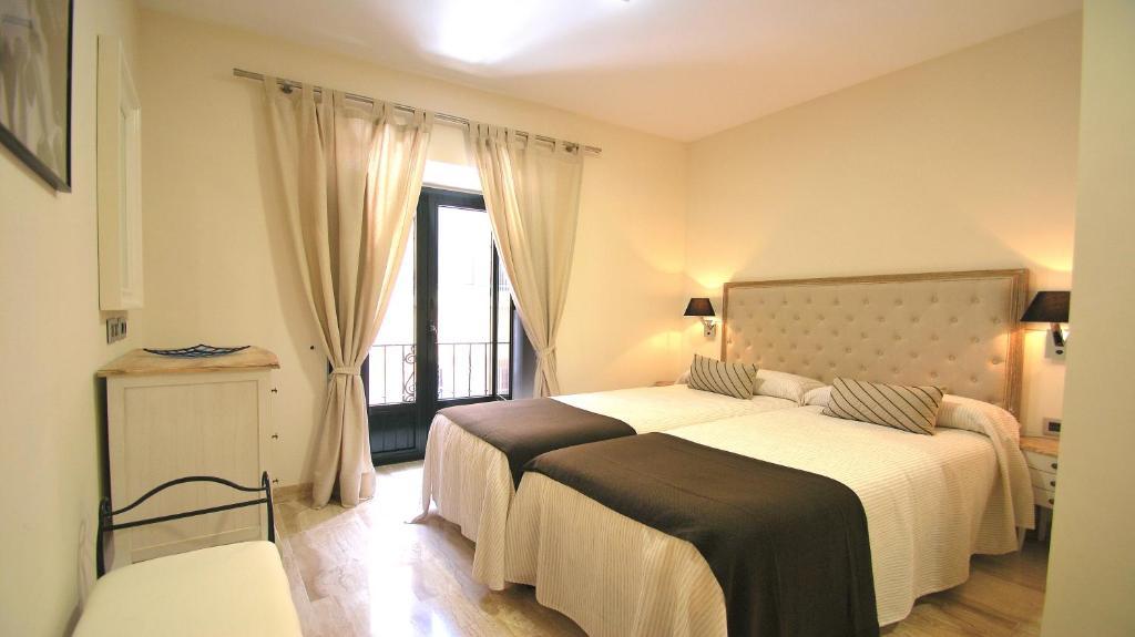 Apartamentos Living Sevilla Centro Maestranza الغرفة الصورة